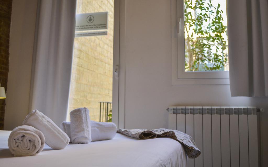 Happy People Plaza Espana Apartments Barcelona Ruang foto